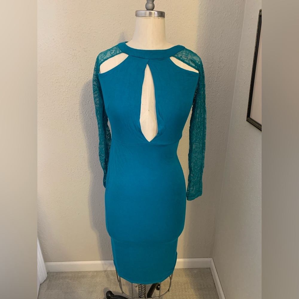 Sexy teal cutout dress with lace sleeves from ASOS. Size 6